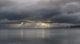 Gorgeous time-lapse of clouds and sunbeams over Northern Ireland lake