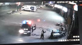 Policeman catches woman falling from building with bare hands