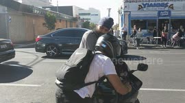 Motorist wrestles with biker after alleged hit-and-run