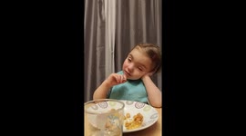 A little girl is sick and falls asleep at the meal