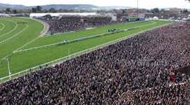 Massive crowd roars as race gets underway on day one