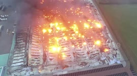 Incredible drone footage shows firefighters tackling huge warehouse blaze