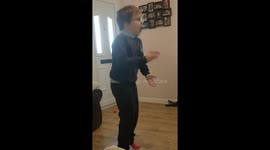 Seven-year-old screams with joy watching horse-race on television