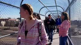 March for our lives #neveragain Student walkout in Thornton Colorado on a bridge seen from traffic. Students tired of school shootings are walking out for a reform for gun control.
