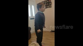 Newsflare Edit - Seven-year-old screams with joy watching horse-race on television