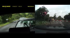 Drunk cyclist climbs over level crossing barrier
