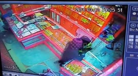 CCTV footage shows tourist attacking gold shop owner with metal bar