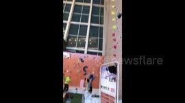 Worker falls off climbing wall in southern China