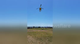 Newsflare Edit - Helicopter dropping Easter eggs