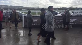 Kenny and Gabby Logan arrive at Cheltenham Festival