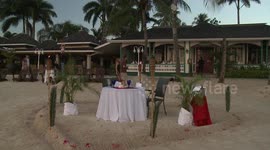 JAMAICA woman walks in front of camera