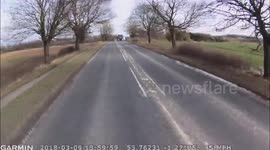 Biker leaves their overtake very late