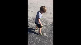Toddler funny dance moves in parking lot