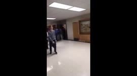 Guy hits head on clock