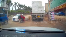 Driver lucky to survive after huge bricks fall from lorry, crushing vehicle