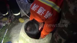 Firefighters rescue woman trapped in well