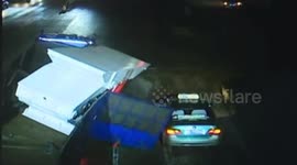 Huge piece of machinery flattens car but driver miraculously survives