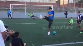Best penalty EVER! Street footballer schools keeper with audacious backheel