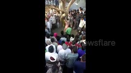 Shocking moment Indian woman is brutally flogged in public for adultery