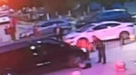 Car runs over boy riding skateboard