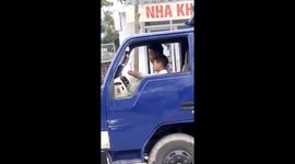 The boy 7-year-old drove a truck with his father