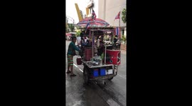 Drinks seller with a wacky mobile stall