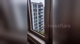 Newsflare Edit - Firefighters kick teenage girl to safety