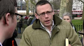 If there is God why so many suffering? at Speaker Corner in Hype Park, London, UK