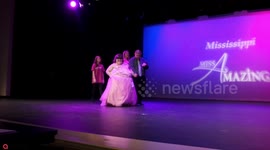 A girl who weighs 380lbs due to a rare condition which causes her to rifle through bins in search of food because she's ALWAYS hungry has been crowned a pageant queen