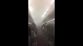 Airplane cabin fills with smoke
