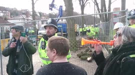 Most British arrest ever! Woman 'detained' after blowing toy trumpet at Sheffield tree protest