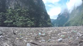 River littered with waste, plastic and rubbish