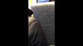 Passengers jumping off Tram in Manchester after pulling emergency door open due to delay.