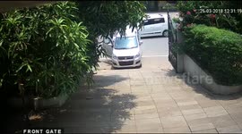 Lucky car rolls back and forth avoiding multiple narrow collisions on busy road