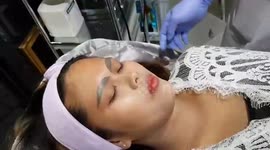 Woman left with giant slug-like eyebrows after botched tattoo job