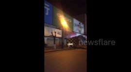 Strong wind blows off billboard in northern China