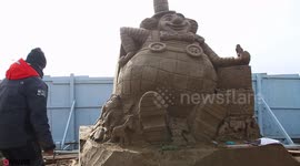 Sand artists create stunning sculptures for circus themed festival