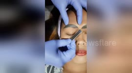 Woman left with giant slug-like eyebrows after botched tattoo job