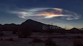 Short time lapse of rainbow colored clouds caused by a Navy submarine missile launch