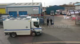 Salisbury police arrive at Ashley Wood Recovery to inspect suspect BMW