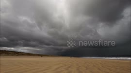 Time-lapse of intense storm clouds over Northern Ireland's Benone Beach
