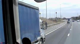 Shocking footage shows lorry driver writing on notepad while driving