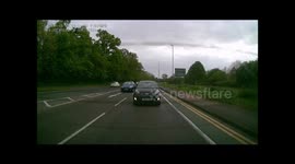 Audi jumping red light the wrong side of traffic lights