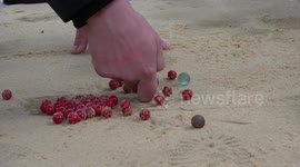 Marbles World Championships held at Sussex pub in torrential rain