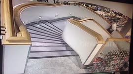 Man falls up stairs