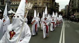 Procession in Spain, white outfits