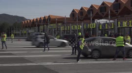 Pro-independence activists lift barriers at Barcelona toll road