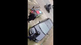 Scooter-riding thieves try to steal motorbike in UK as owners watch on