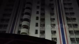Fire in apartment block kills three and injures 60