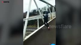 Youth throws trolley from traffic bridge onto dual carriageway
